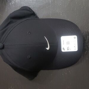 Unisex Nike Club Cap, size M/L, Color Black with white swoosh.
